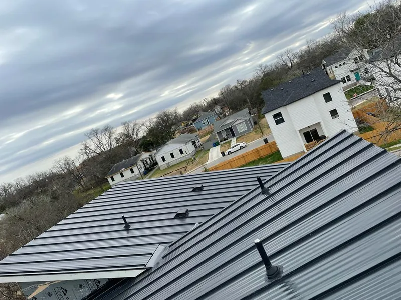 Standing seam metal roof panels with vents for Skylight Repair in West Bend